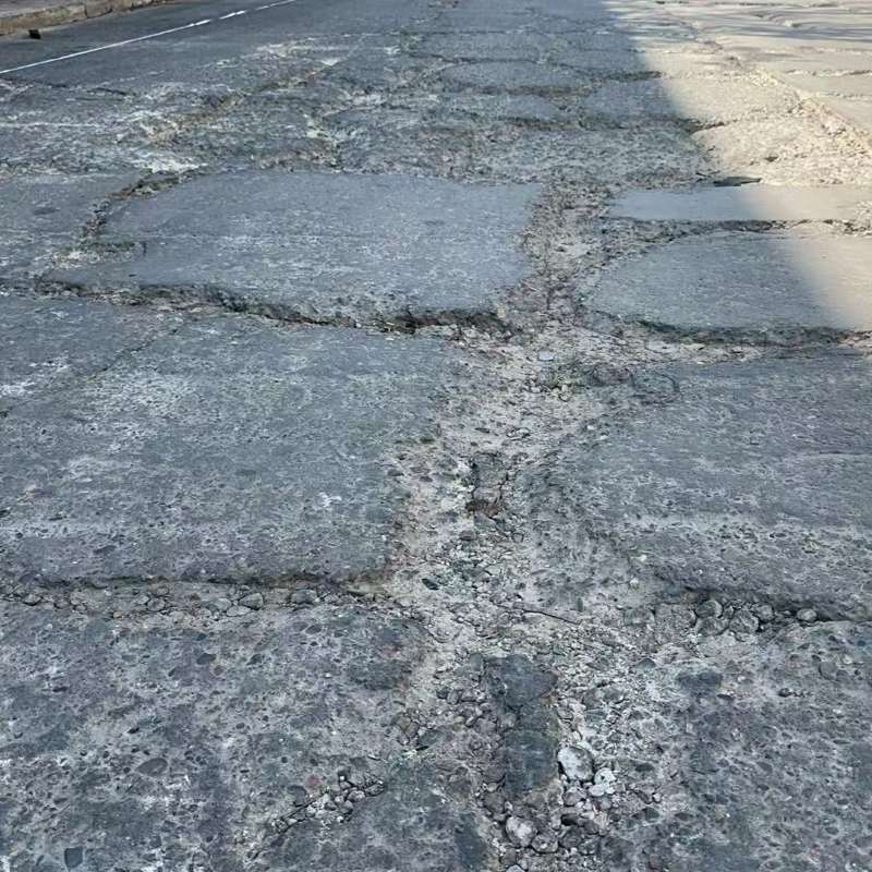 滦南路面起砂露石子修补料